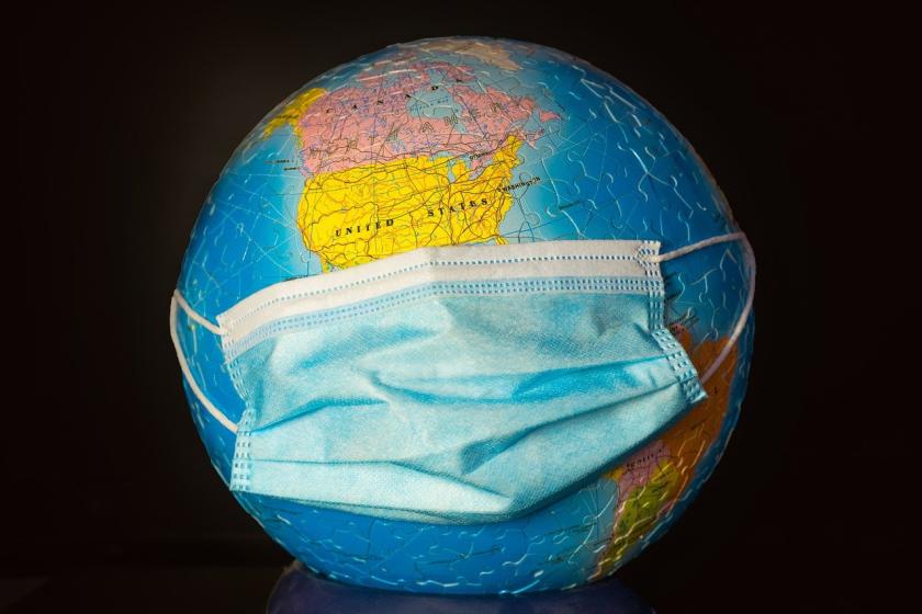 globe with mask on it